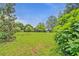 Lush green backyard, perfect for recreation or relaxation at 4547 Atha Cir, Loganville, GA 30052
