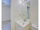 Bathroom featuring a vanity with a sink, mirror, and toilet at 4547 Atha Cir, Loganville, GA 30052
