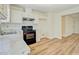 Updated kitchen featuring stylish countertops, modern floors, and new appliances at 4547 Atha Cir, Loganville, GA 30052