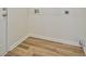 Laundry room featuring laminate floors and hookups for washer and dryer at 4547 Atha Cir, Loganville, GA 30052