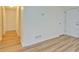 Hardwood floors with a view of the entryway and closet space at 4547 Atha Cir, Loganville, GA 30052