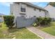 Charming townhome featuring a fenced entrance and low maintenance landscaping at 556 Country Greens Dr, Jonesboro, GA 30238