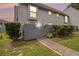 Charming townhome featuring a fenced entrance and low maintenance landscaping at 556 Country Greens Dr, Jonesboro, GA 30238