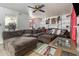 Comfortable living room with an oversized sofa, and a ceiling fan at 556 Country Greens Dr, Jonesboro, GA 30238