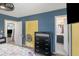 Spacious bedroom showcasing a large dresser, a closet, and an ensuite bathroom with modern fixtures at 556 Country Greens Dr, Jonesboro, GA 30238
