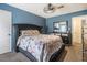 A well-appointed main bedroom featuring stylish decor, a comfortable bed, and coordinating furniture at 556 Country Greens Dr, Jonesboro, GA 30238