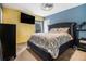 Comfortable main bedroom with stylish bedding, a large window for natural light, and ample space at 556 Country Greens Dr, Jonesboro, GA 30238