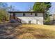 The backyard features brick and wood construction and green vegetation at 817 N Evelyn Nw, Atlanta, GA 30318