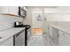 The kitchen has stainless appliances and marble flooring at 817 N Evelyn Nw, Atlanta, GA 30318