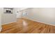 Spacious living area with hardwood floors and an open layout to the kitchen at 817 N Evelyn Nw, Atlanta, GA 30318