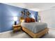 Inviting bedroom features stylish decor, a queen bed, and elegant design at 1150 Collier Nw Rd # L14, Atlanta, GA 30318