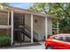 Charming building exterior with stairs, offering easy access and a welcoming facade at 1150 Collier Nw Rd # L14, Atlanta, GA 30318