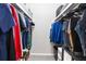 Spacious walk-in closet provides ample storage with organized shelving and hanging space at 1150 Collier Nw Rd # L14, Atlanta, GA 30318