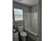 Clean bathroom featuring a tub/shower combination at 165 Heaton Place Trl, Covington, GA 30016