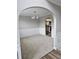 Open dining room features fresh paint, modern lighting, and decorative trim at 165 Heaton Place Trl, Covington, GA 30016