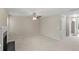 Spacious living room with lots of natural light and fireplace at 165 Heaton Place Trl, Covington, GA 30016