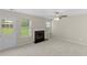 Living room with natural light and fireplace at 165 Heaton Place Trl, Covington, GA 30016