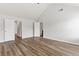 Bedroom features hardwood style flooring and two entry doors at 1931 Old Dogwood, Jonesboro, GA 30238