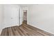 Bright bedroom with ample closet space and wood floors at 1931 Old Dogwood, Jonesboro, GA 30238