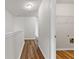 Hallway features hardwood-style flooring and neutral wall paint at 1931 Old Dogwood, Jonesboro, GA 30238