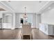 Cozy dining room featuring hardwood floors, recessed lighting, and a large window providing natural light at 2029 Havenhurst Way, Auburn, GA 30011