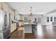 Bright modern kitchen with stainless steel appliances, granite counters and views to the backyard at 2029 Havenhurst Way, Auburn, GA 30011