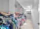 Spacious walk-in closet with ample shelving and rod space for organized storage solutions at 2029 Havenhurst Way, Auburn, GA 30011