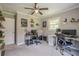 Spacious bedroom with two large desks, neutral walls and a ceiling fan at 205 Plantation Sw Rd, Smyrna, GA 30082
