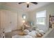 Comfortable Bedroom with window, closet, a soft rug, and rocking sheep at 205 Plantation Sw Rd, Smyrna, GA 30082