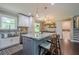 Open kitchen featuring granite countertops, stainless steel appliances, and a center island at 205 Plantation Sw Rd, Smyrna, GA 30082