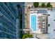 Top-down view of a community pool and high-rise apartments at 361 17Th St # 2120, Atlanta, GA 30363