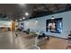 Modern gym with fitness equipment and inspirational wall art at 361 17Th St # 2120, Atlanta, GA 30363
