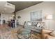 Cozy living area with a plush sofa and a colorful area rug at 361 17Th St # 2120, Atlanta, GA 30363