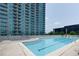 Community pool features a long rectangular shape with lots of room for swimming at 361 17Th St # 2120, Atlanta, GA 30363