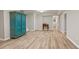 View of the finished basement featuring modern flooring and access to the bathroom and bedroom at 1183 Woods Ne Cir, Atlanta, GA 30324