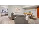 Finished basement with cozy seating area, desk, and ping pong table in the background at 1183 Woods Ne Cir, Atlanta, GA 30324