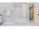 Clean bathroom featuring a tiled shower/tub combination with a white shower curtain at 1183 Woods Ne Cir, Atlanta, GA 30324