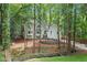 Beautiful home surrounded by lush greenery and mature trees at 1183 Woods Ne Cir, Atlanta, GA 30324