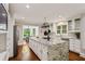 Spacious updated kitchen featuring a granite island, stainless steel appliances, and backyard views at 1183 Woods Ne Cir, Atlanta, GA 30324