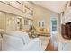 Bright and open living room with a cozy fireplace and access to outdoor spaces at 1183 Woods Ne Cir, Atlanta, GA 30324
