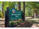 Shady Valley Park sign in a lush green setting in Atlanta at 1183 Woods Ne Cir, Atlanta, GA 30324