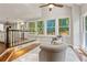 Cozy sunroom with ample natural light and views of the surrounding landscape at 1183 Woods Ne Cir, Atlanta, GA 30324
