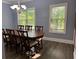 Dining room featuring natural light and an oversized wood table at 1462 Knights Trl, Stone Mountain, GA 30083