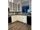 Kitchen featuring white cabinets, stainless steel appliances, and granite countertops at 1462 Knights Trl, Stone Mountain, GA 30083