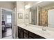 Neutral bathroom featuring double vanity sinks and a shower and tub combo with decorative shower curtain at 3909 Obryant Se Cir, Smyrna, GA 30082