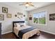 A cozy bedroom bathed in natural light from the window with decorative wall art at 3909 Obryant Se Cir, Smyrna, GA 30082