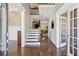 Inviting foyer with hardwood floors, staircase, and open view to the living spaces at 3909 Obryant Se Cir, Smyrna, GA 30082