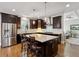 Modern kitchen featuring stainless steel appliances, granite countertops, and a large island at 3909 Obryant Se Cir, Smyrna, GA 30082