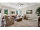 Bright living room featuring hardwood floors, neutral tones, and an abundance of natural light at 3909 Obryant Se Cir, Smyrna, GA 30082