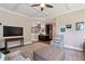Open-concept living area boasts natural light, coffered ceilings, and seamless flow to other rooms at 3909 Obryant Se Cir, Smyrna, GA 30082